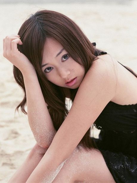 Jun Natsukawa Asian cutie posing at the beach in her minidress