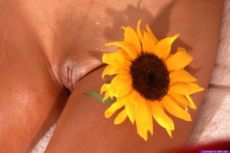 This young adorable flower shows off her sexy body and her mouth watering pussy