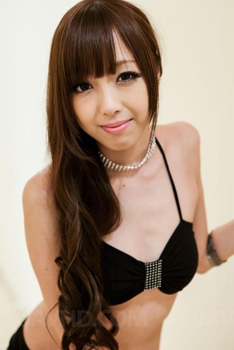 Anri Asian doll in very short skirt sucks phallus and shows jugs