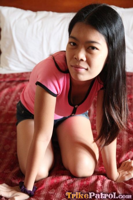 Asian teen Marie strips and shows her hot butt and tits in a solo