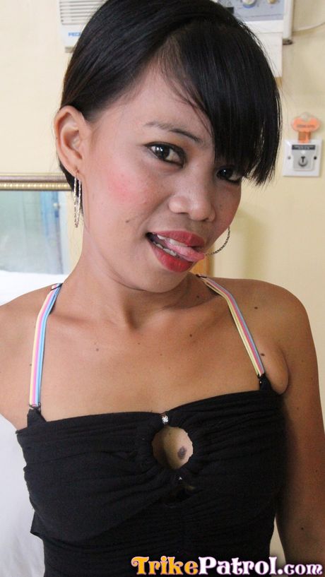 Asian cougar Leeann strips and shows her hairy cunt and tits in a solo