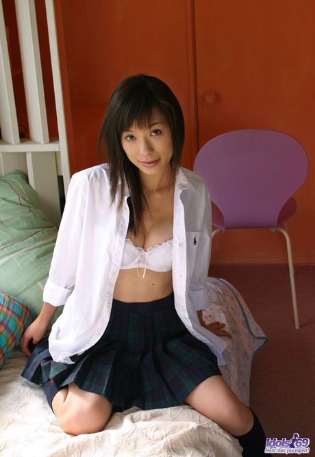 Japanese college tramp gets naked in the boys locker room for a surprise treat